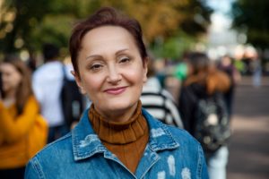 woman smiling on street