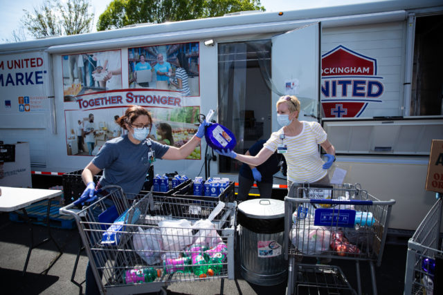 Lady loading groceries
